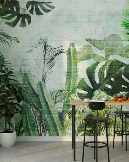 Fototapete mit tropischen Pflanzen auf einem strukturierten Hintergrund einer hellen Backsteinmauer für die Küche