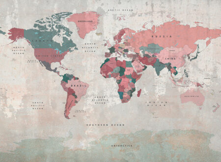 Fototapete Weltkarte in rosa und grünen Farben auf der Textur einer beigen Betonwand