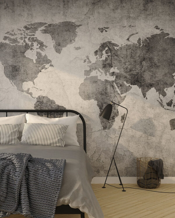 Fototapete Weltkarte Vintage in dunklen Grautönen auf einem grauen strukturierten Wandhintergrund für das Schlafzimmer